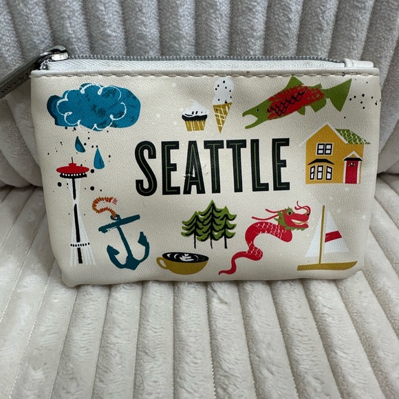 Starbucks Accessories - Starbucks Seattle,Wa branded coin purse w/zipper. Cute - it holds cards and key.